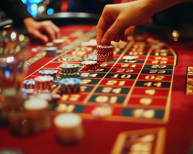 betlazada Teen Patti dealer in professional studio with multiple camera angles